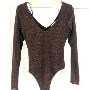 Golden black bodysuit.